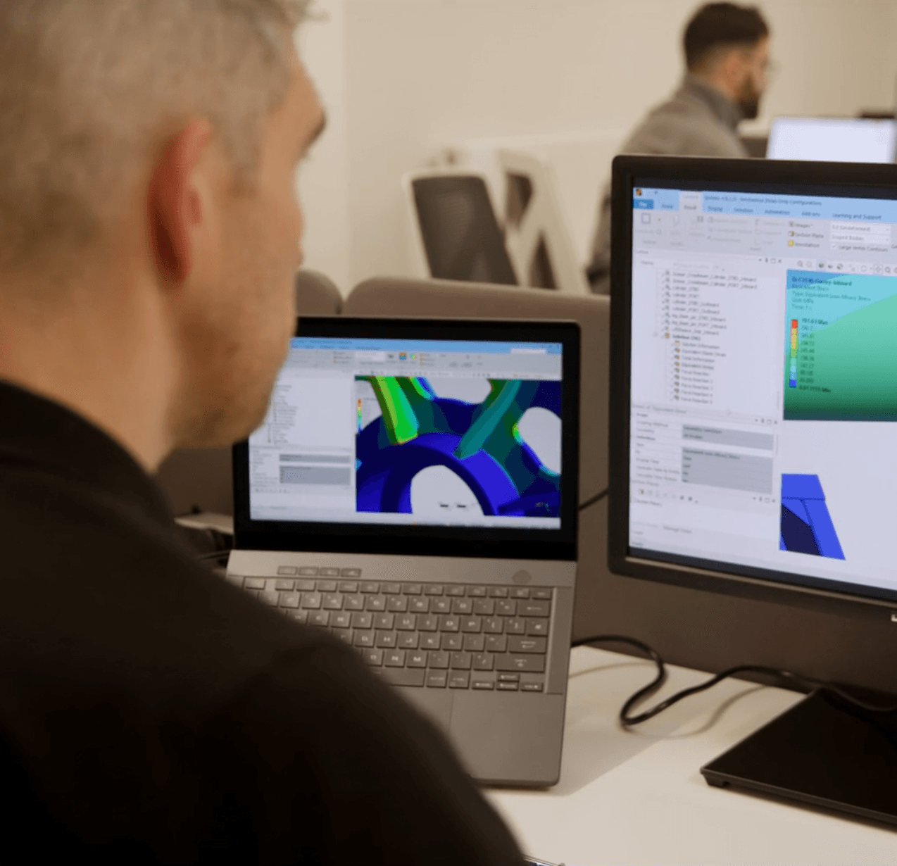 Finite element analysis model showing a colour-mapped stress distribution